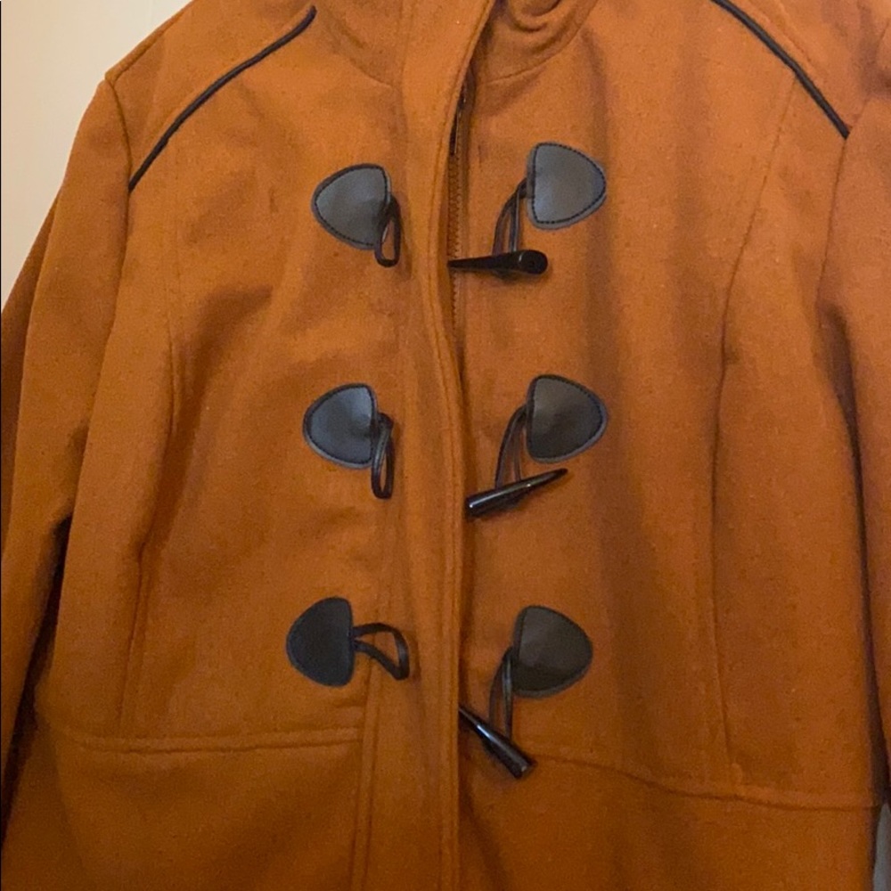 Nice Fall or winter woman’s coat. Rust color NWOT